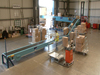 IMPORT SERVICES LIMITED CHOOSE NEWLAND BOOM CONVEYOR SYSTEMS