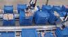 New robots collaborate to lift trays and crates