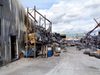 Warehouses and external storage area destroyed by chemical fire