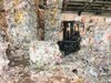 Worker injured in warehouse by falling waste bale
